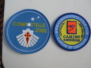 Material badges from Compostelle 2000 and Camino Downunder